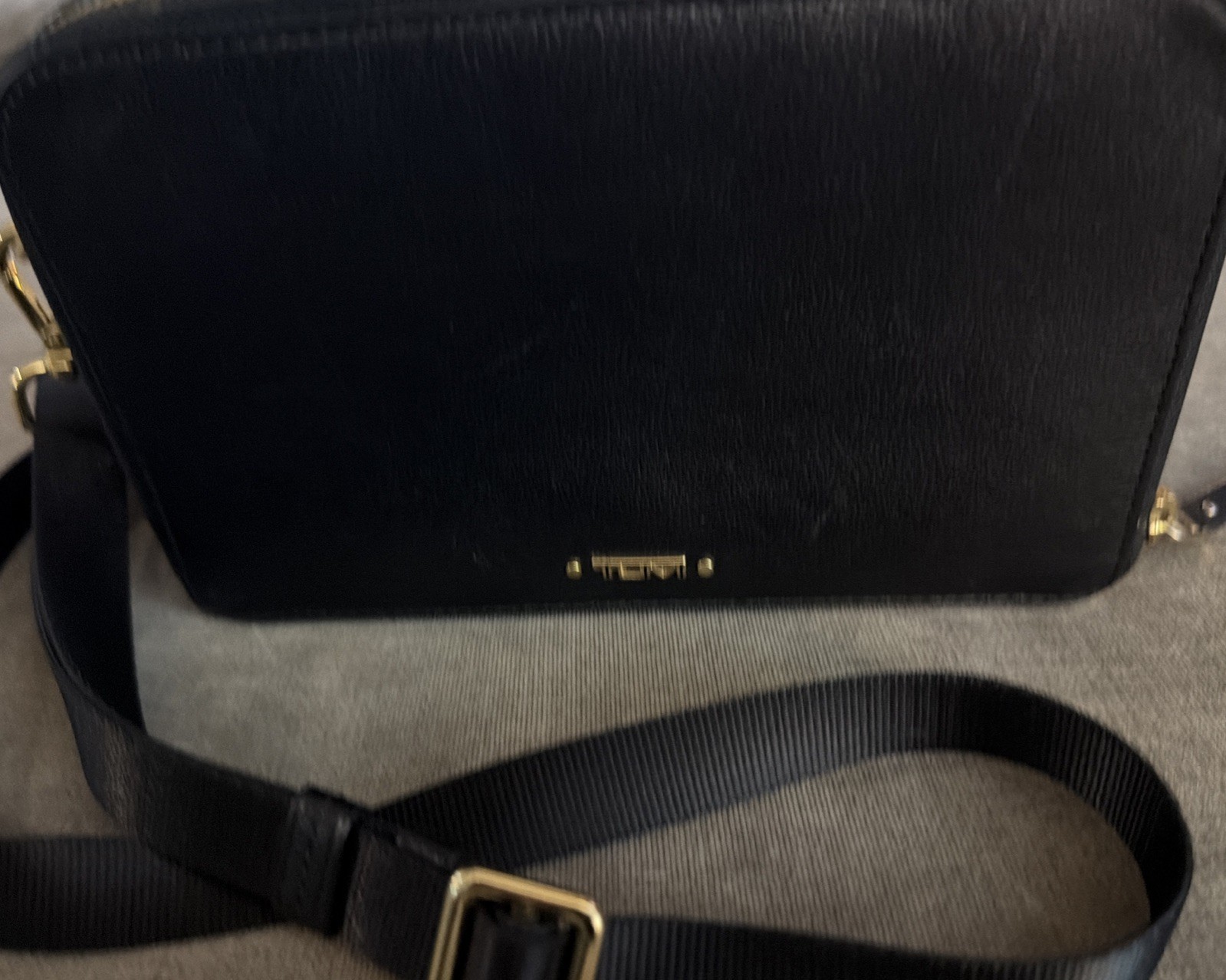 TUMI Black Solid Crossbody Bag Zip Closure Gold Hardware Detachable Strap