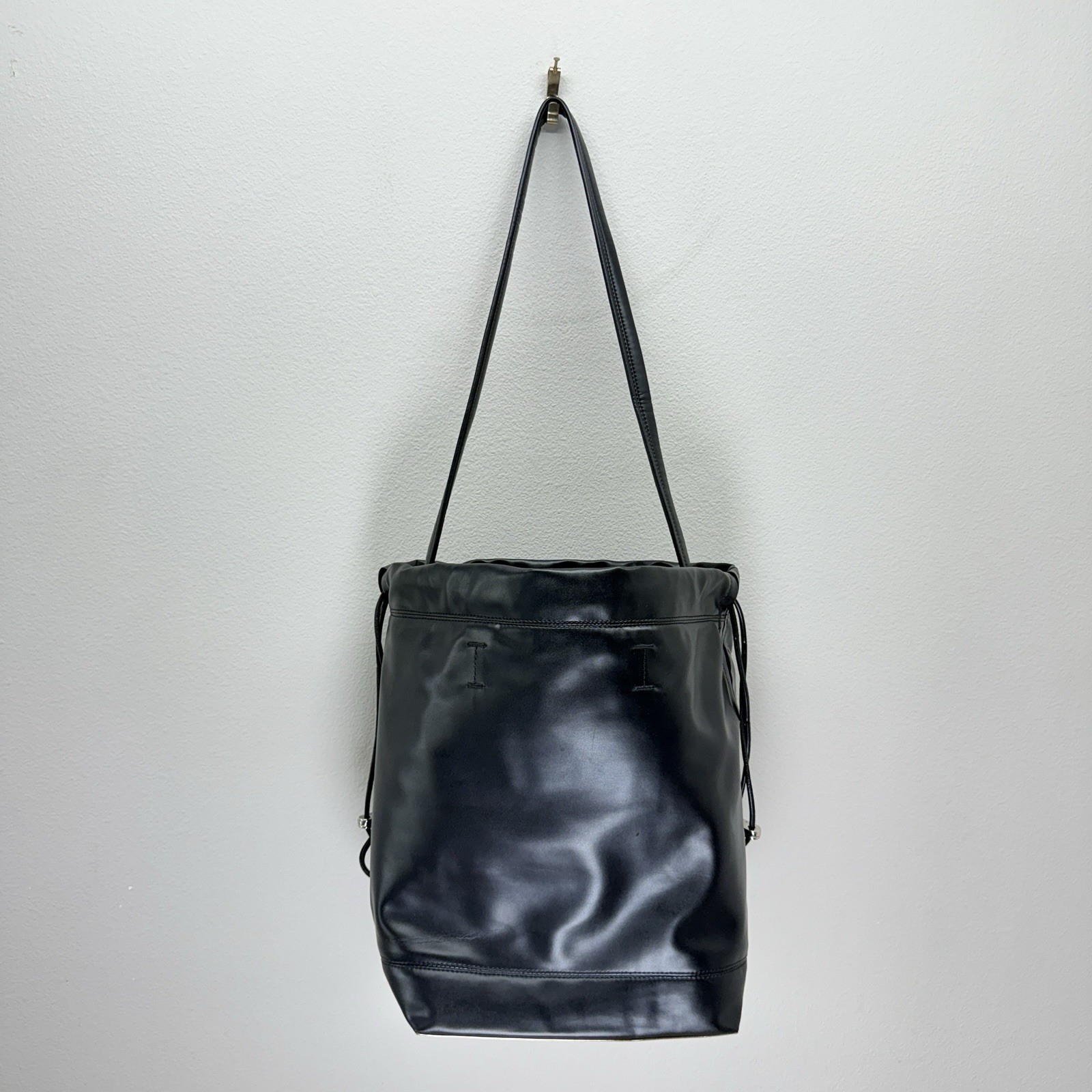 Paco Rabanne Bucket Bag Cinch Top Faux Leather Black Minimalist Quiet Luxury