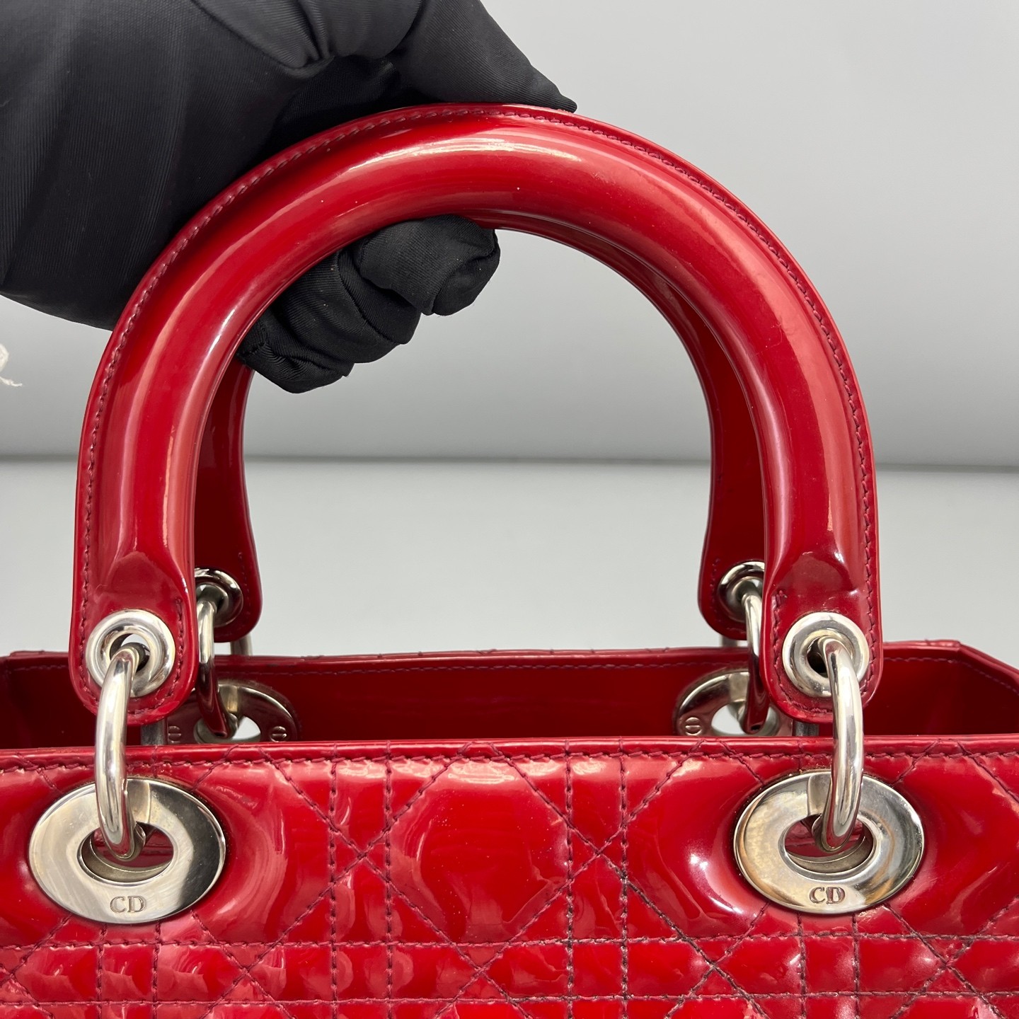 AUTH DIOR Lady Dior Medium Red Patent Leather Top Handle Bag.