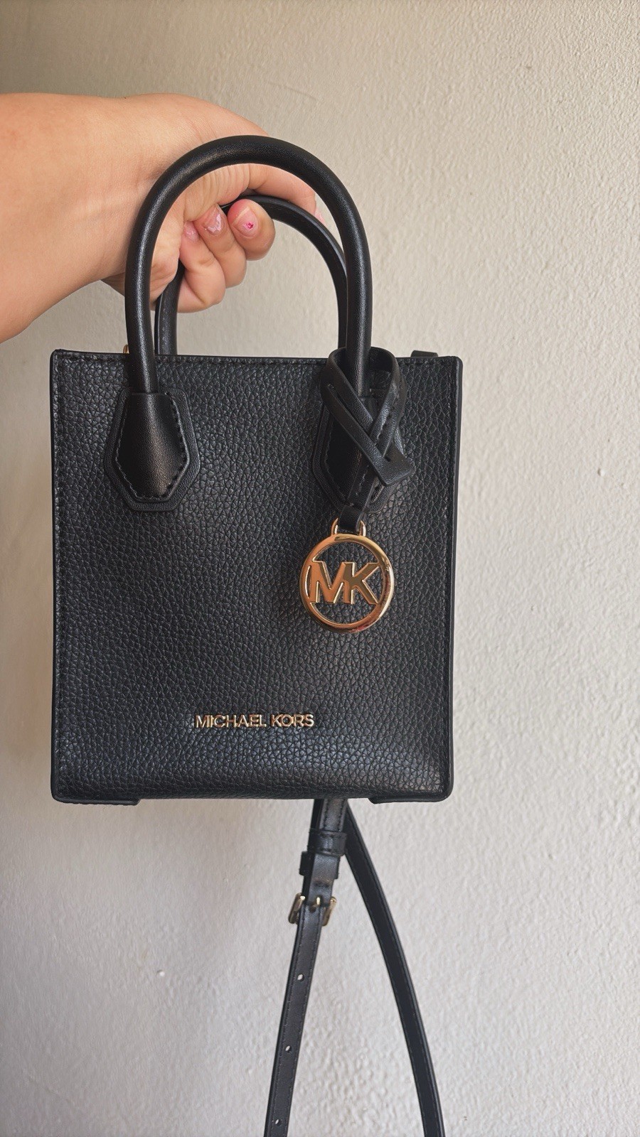 Authentic Michael Kors Black hand and shoulder bag.