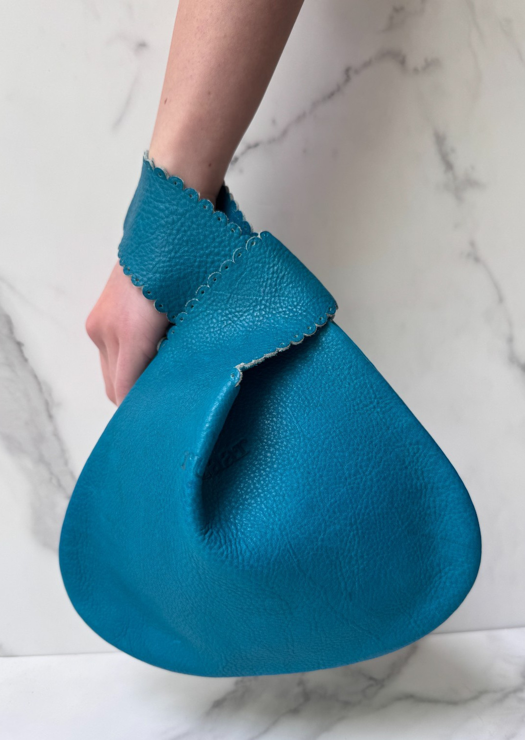 Pre-Owned RUBYZAAR Blue Pebbled Perforated Lace Leather Teardrop Wristlet Bag
