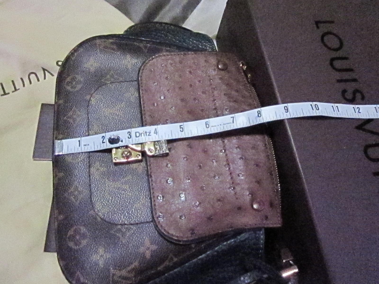 Louis Vuitton shoulder majesteau exotic purse never used