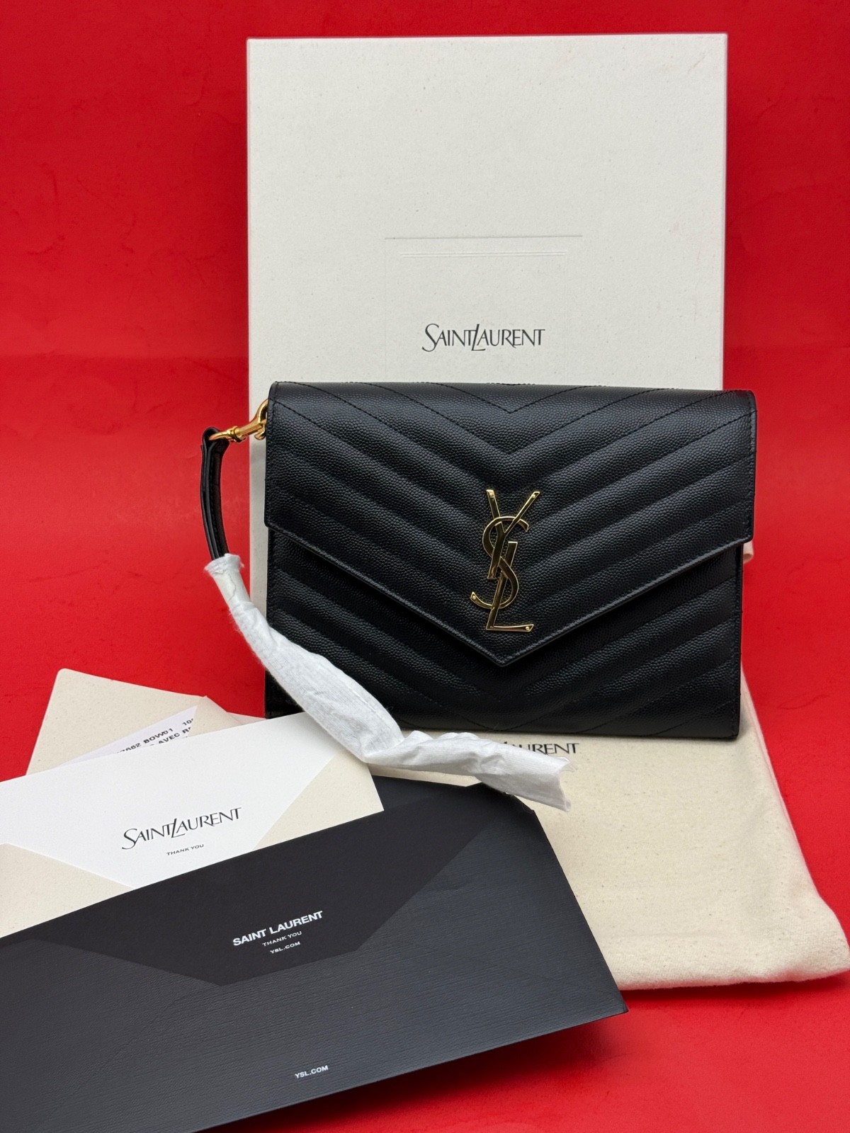 YSL Saint Laurent Cassandre Matelasse Wristlet Flap Pouch Clutch Black Leather.