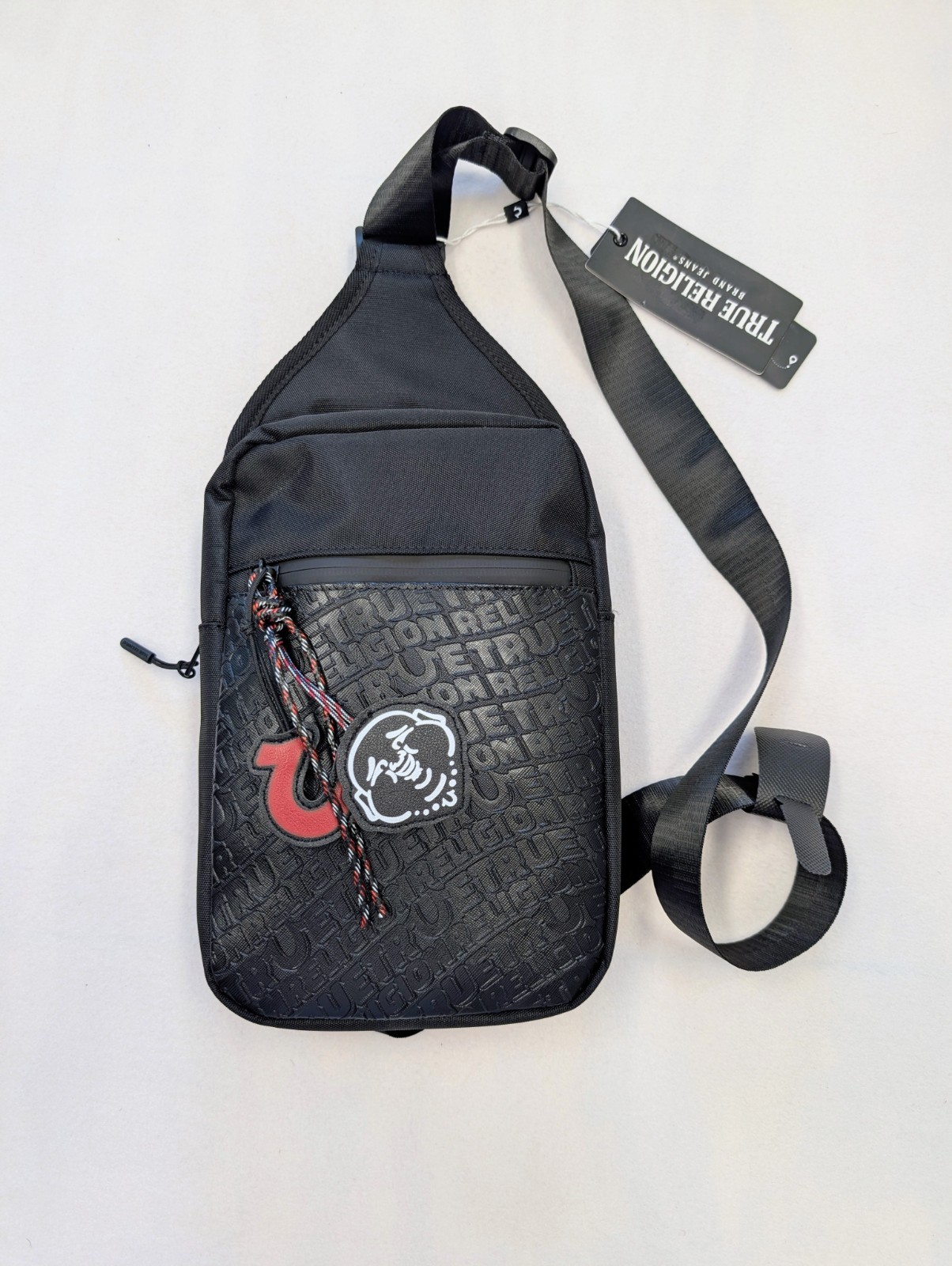 True Religion Allover Print Buddha Charm Sling Bag Black Crossbody Purse NWT