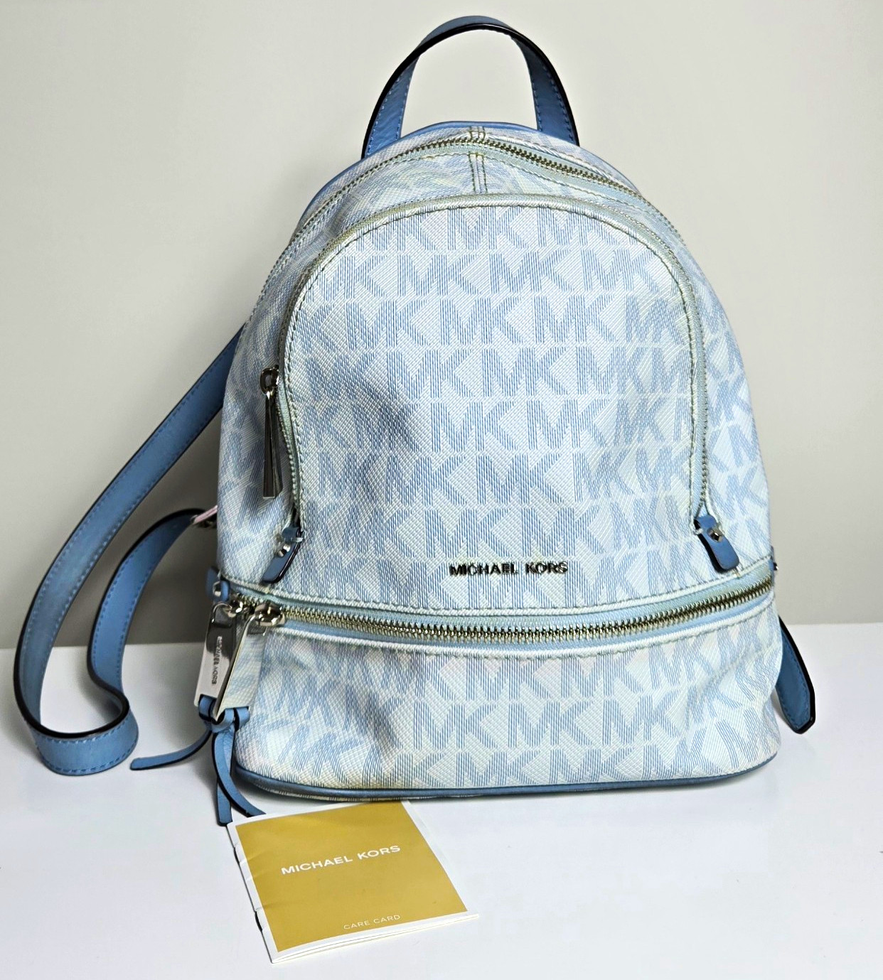 RARE Michael Kors Rhea Medium Backbag Signature Logo Soft Sky Blue White