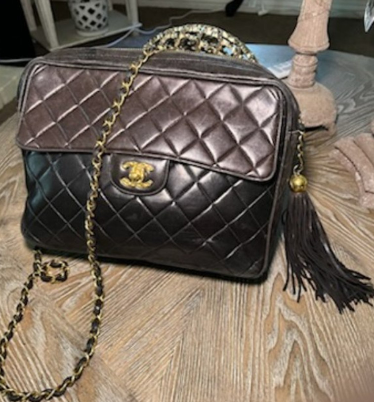 Vintage Chanel Handbag with gold hardware. Used but good condition.