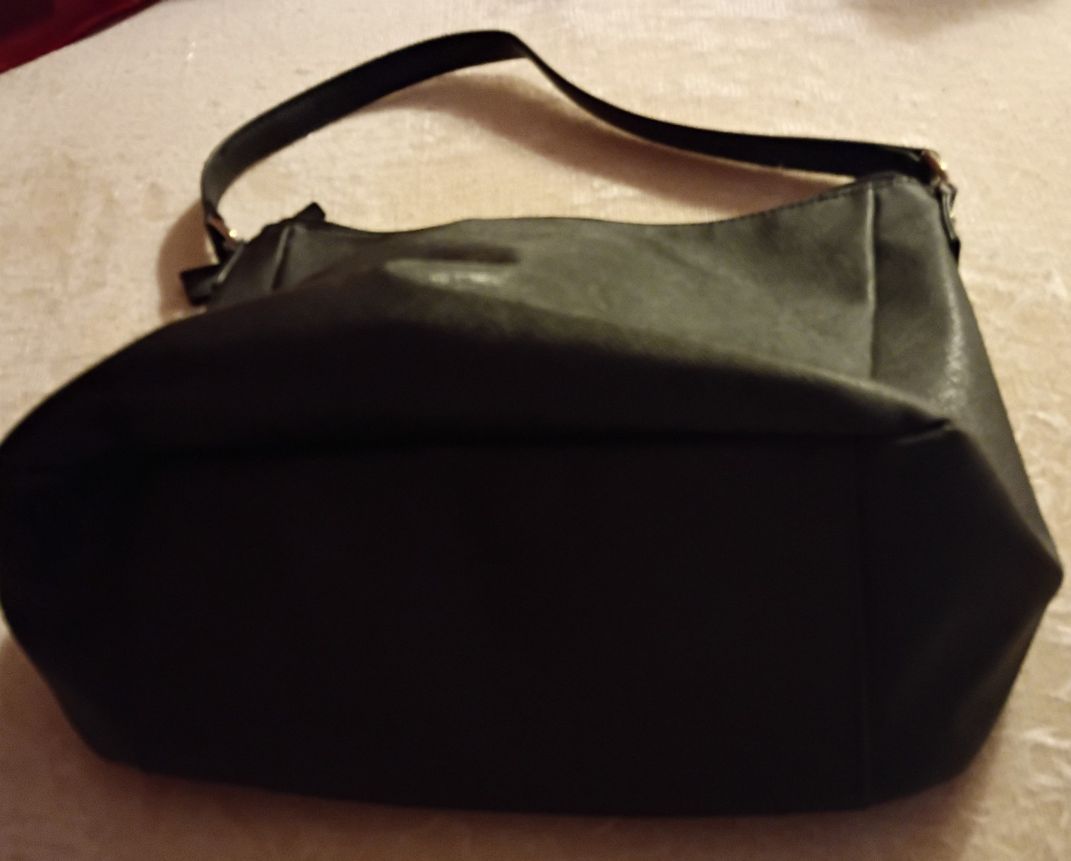Black Tommy Hilfiger purse 13.5 X 10 inch faux leather, dated 2016 looks unused