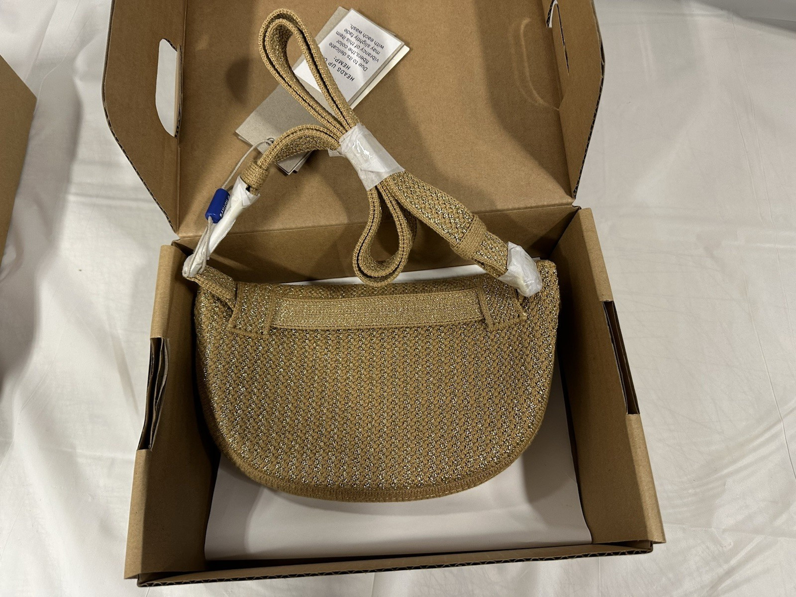 Rothy’s The Casual Sling Gold Stripe Bag