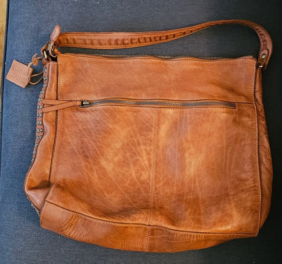 Brand New and Authentic Genuine Leather Handman Handbag Made in India.