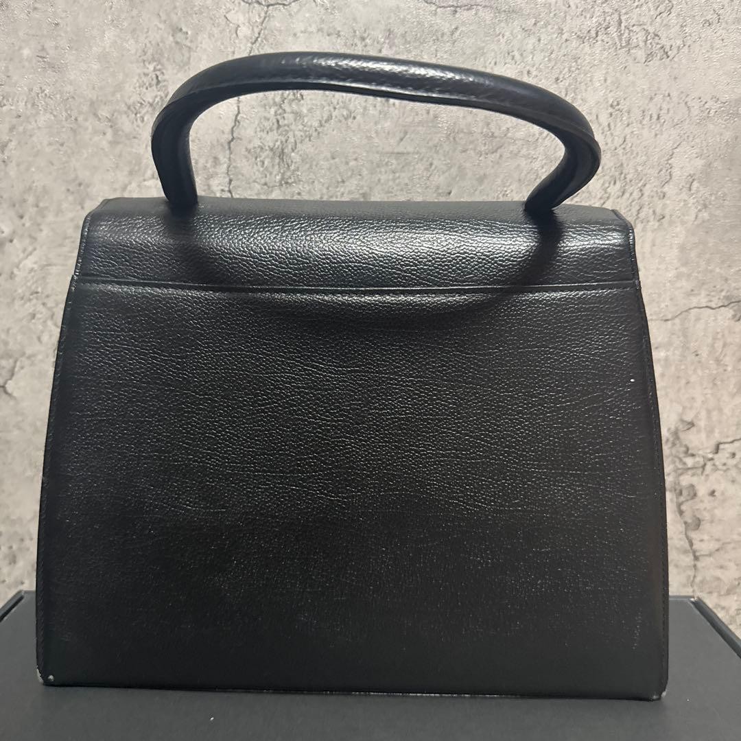 Yves Saint Laurent Handbag Leather Black button Cassandra formal Condition Used