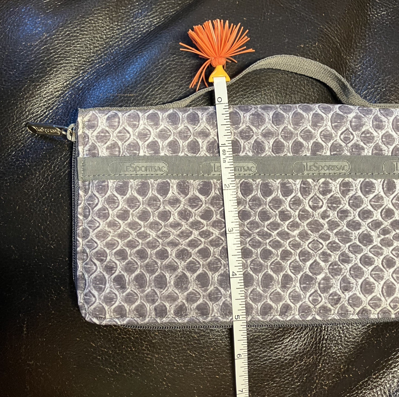 LeSportsac Grey Snake Pattern Hand Held Clutch Wallet 9.25 long X 5.25 in tall.