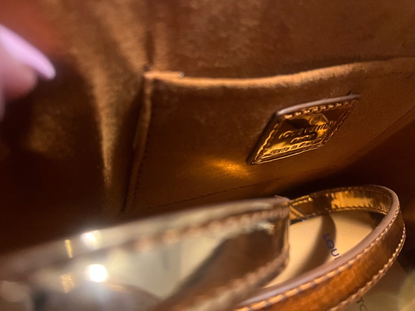 Louis Vuitton Alma Monogram Miroir (Gold Mirror) bag.