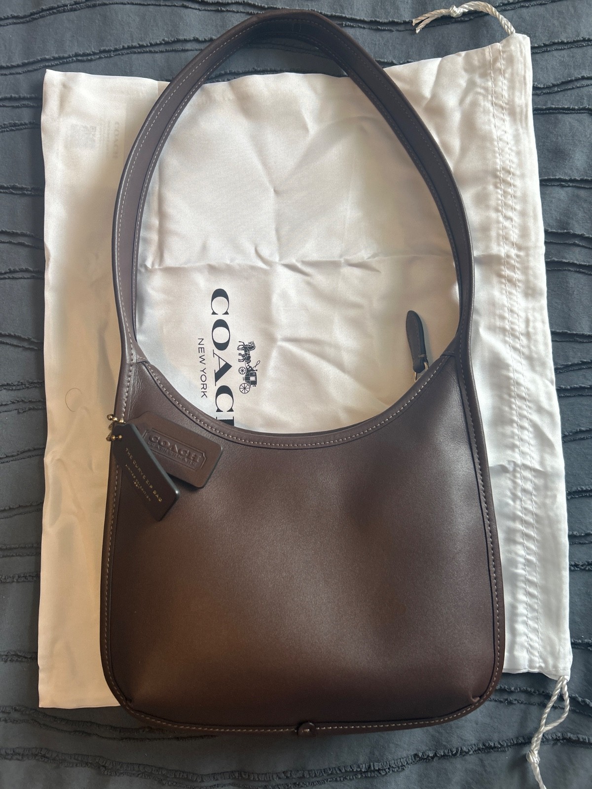 coach curve zip shoulder bag