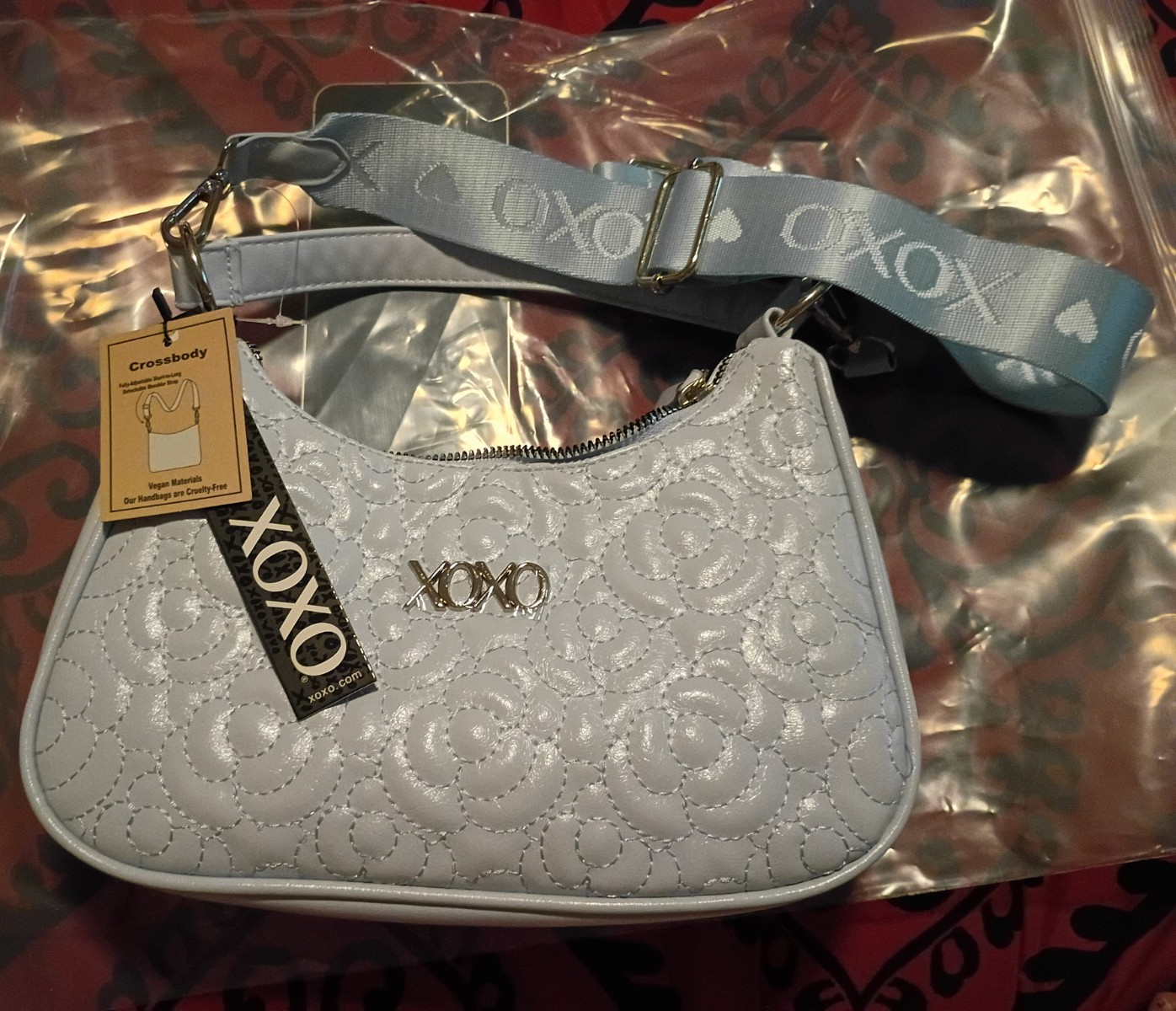 XOXO Light Blue Quilted Logo Crescent Crossbody Bag Zip, Adjustable Strap