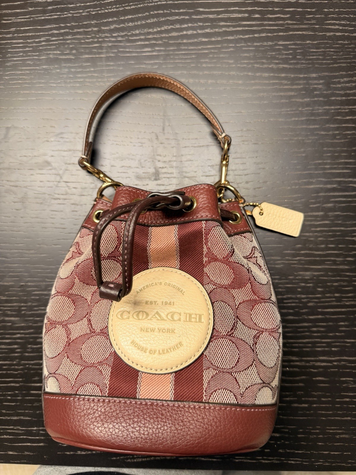 Coach Brown Beige Red Logo Bucket Bag Drawstring Gold Hardware Top Handle