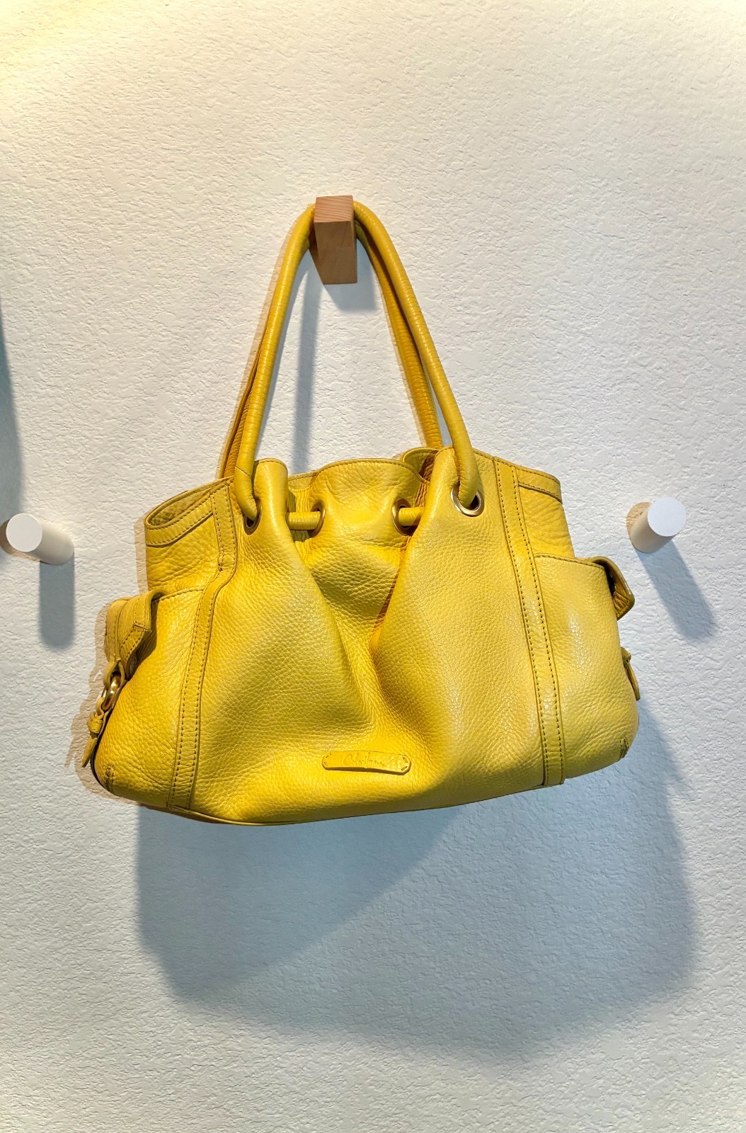 Cole Haan yellow hand bag or shoulder bag in great condition