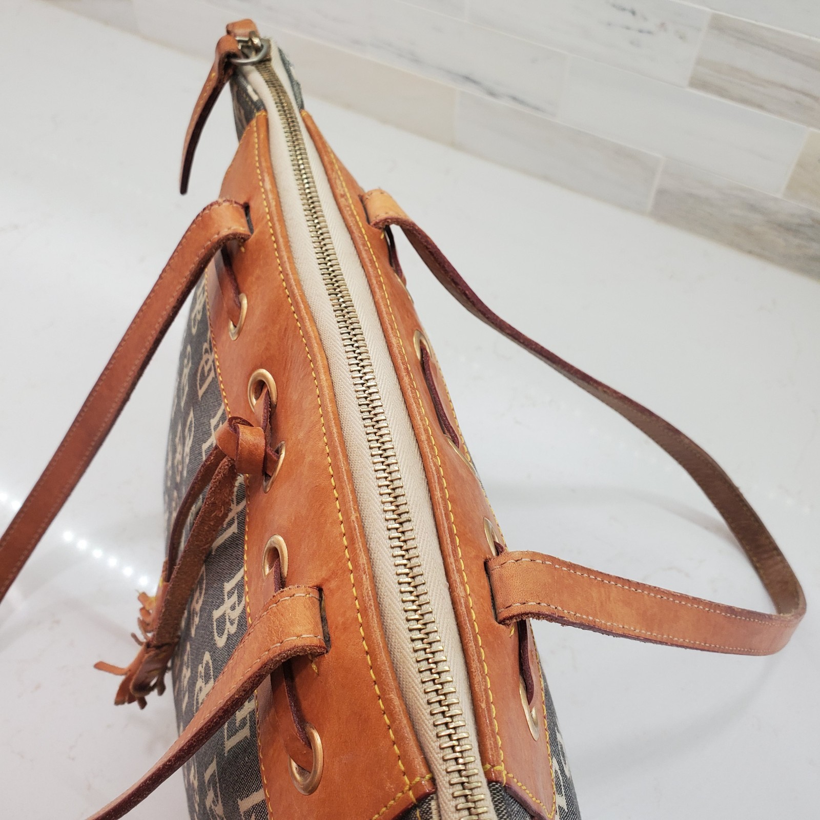 Dooney & Bourke Large Tassel Top Zip Bag Leather &Logo Fabric Double Handle