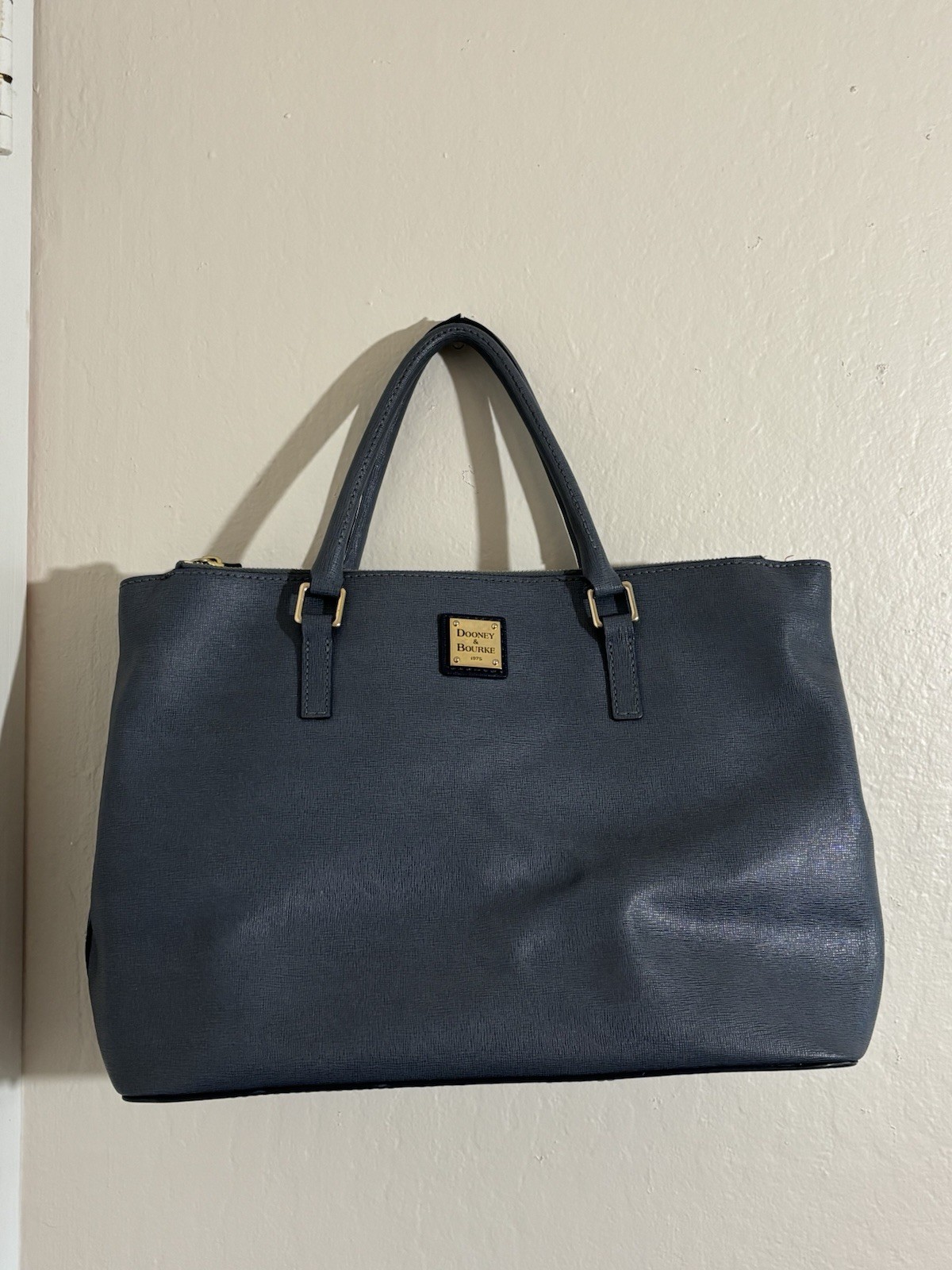 Dooney & Bourke Blue/grey satchel. Large enough to fit laptop. Red interior.