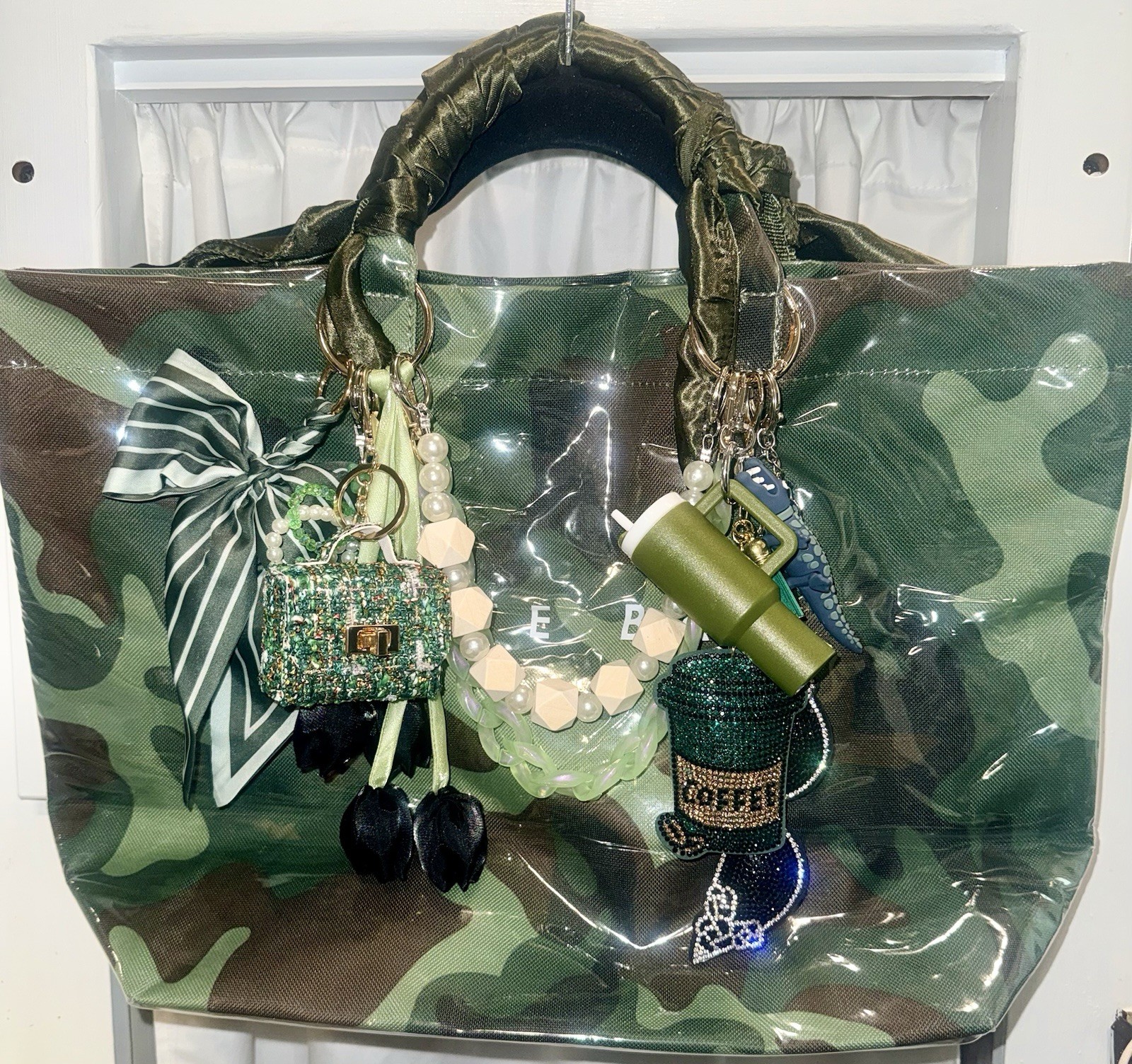Green Camouflage Vinyl Tote Bag adorned with charms! 💚🩶