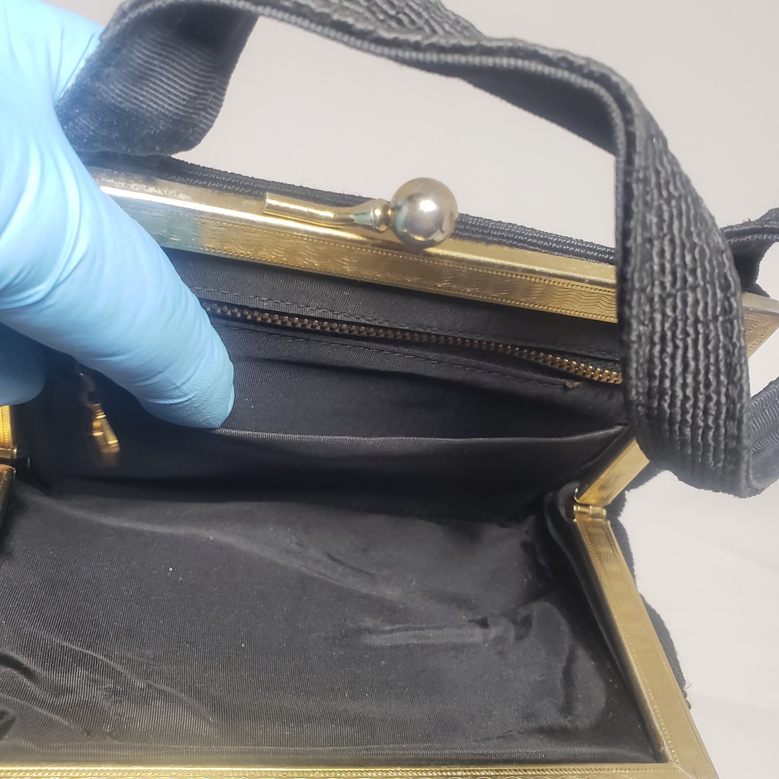 Small Black Corde Hand Bag Snap Closure 1 Zip Interior Pocket 1 Open Used Worn