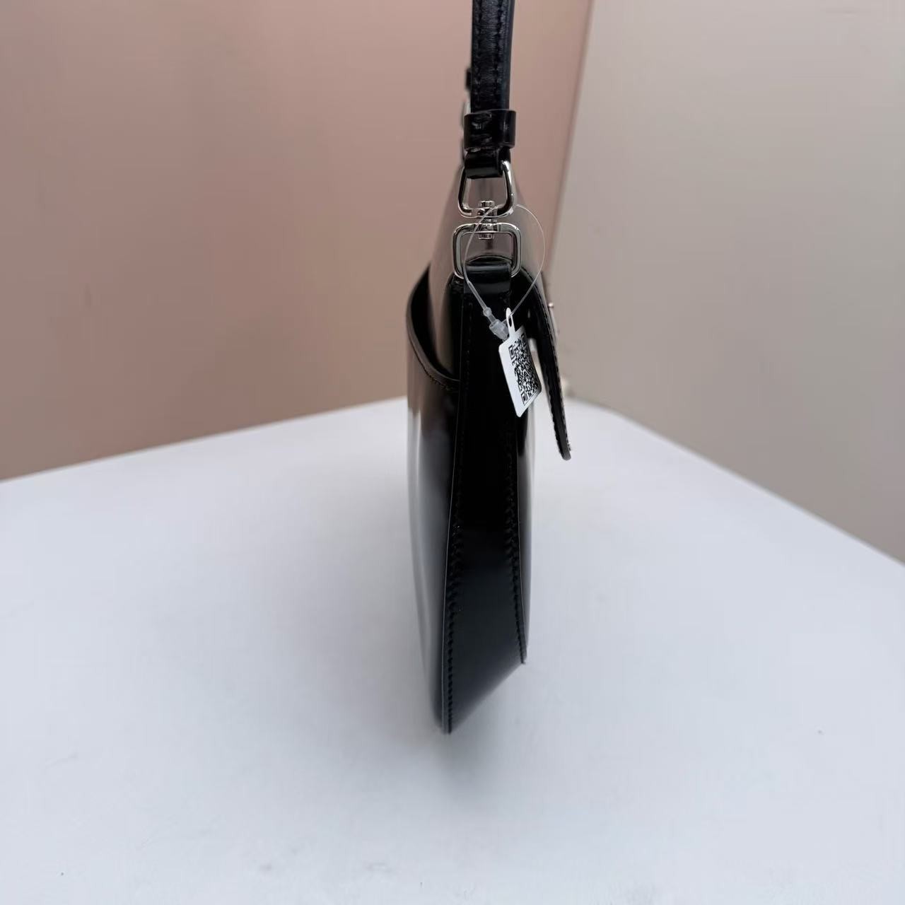 Prada Cleo Small Black Brushed Leather Saddle Bag with Silver Triangle Logo