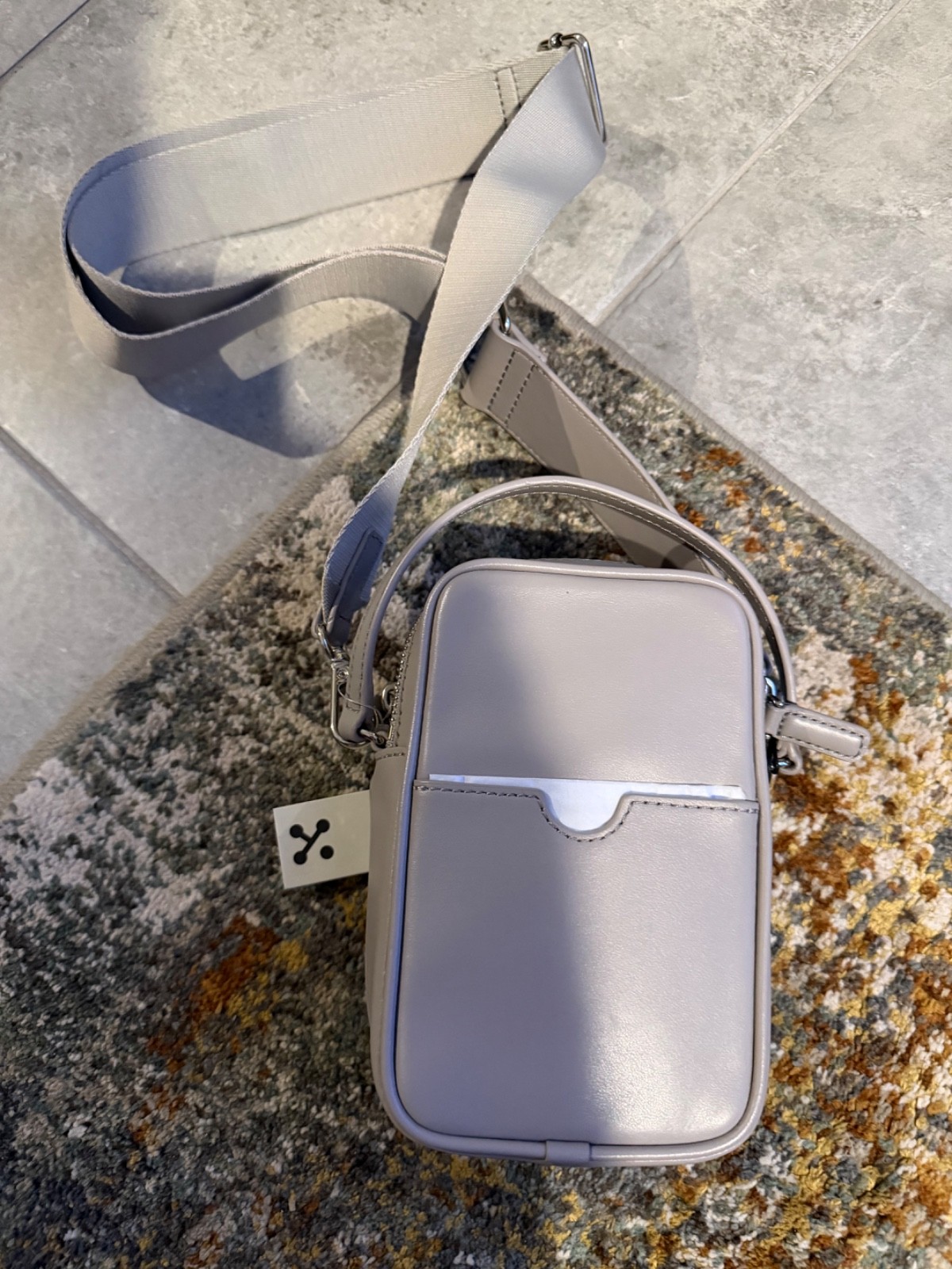 We Ar4 Souvenir Crossbody Bag in Grey
