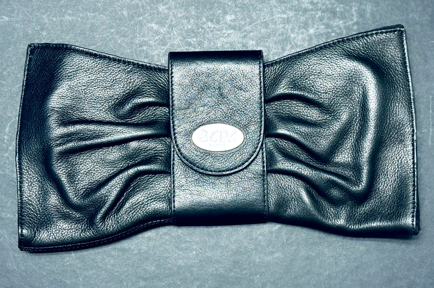 New BCBG Paris Black Leather Bow Shaped Clutch Bag Purse Zip Closure 11.25″ x 6″
