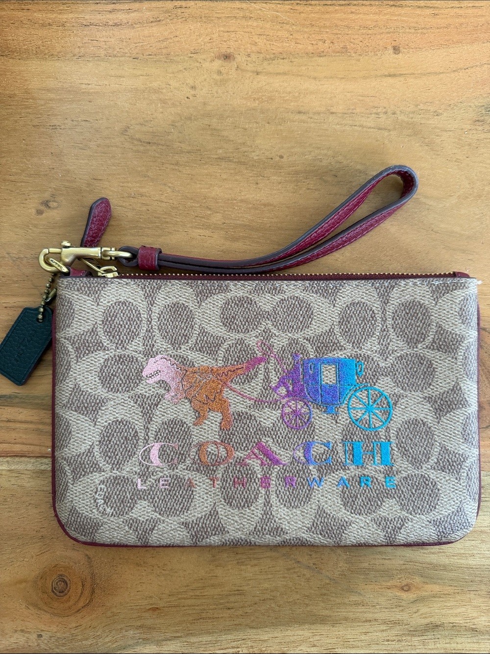 NWOT Coach Wristlet in Signature Canvas with Rexy and Carriage