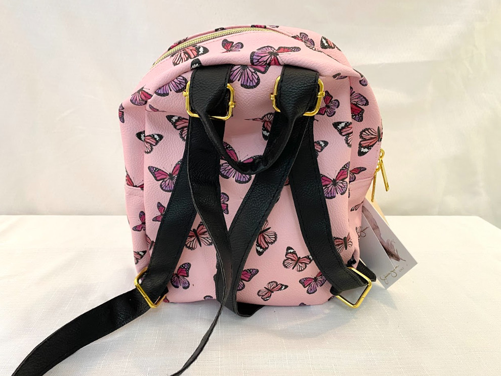 New Jessica Simpson butterfly print backpack light pink gold logo NWT
