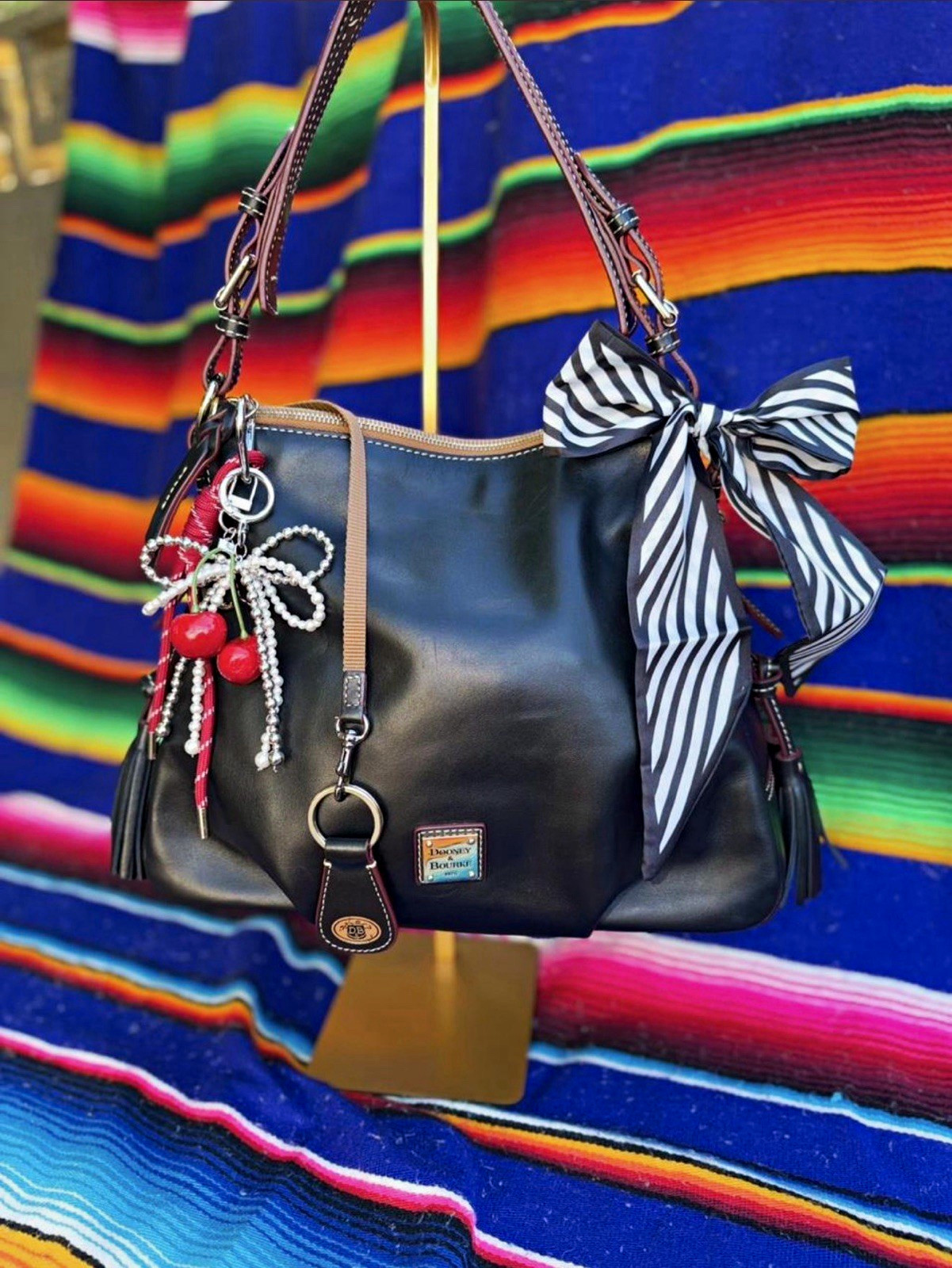 Dooney & Bourke Black Shoulder Bag. Charms included.