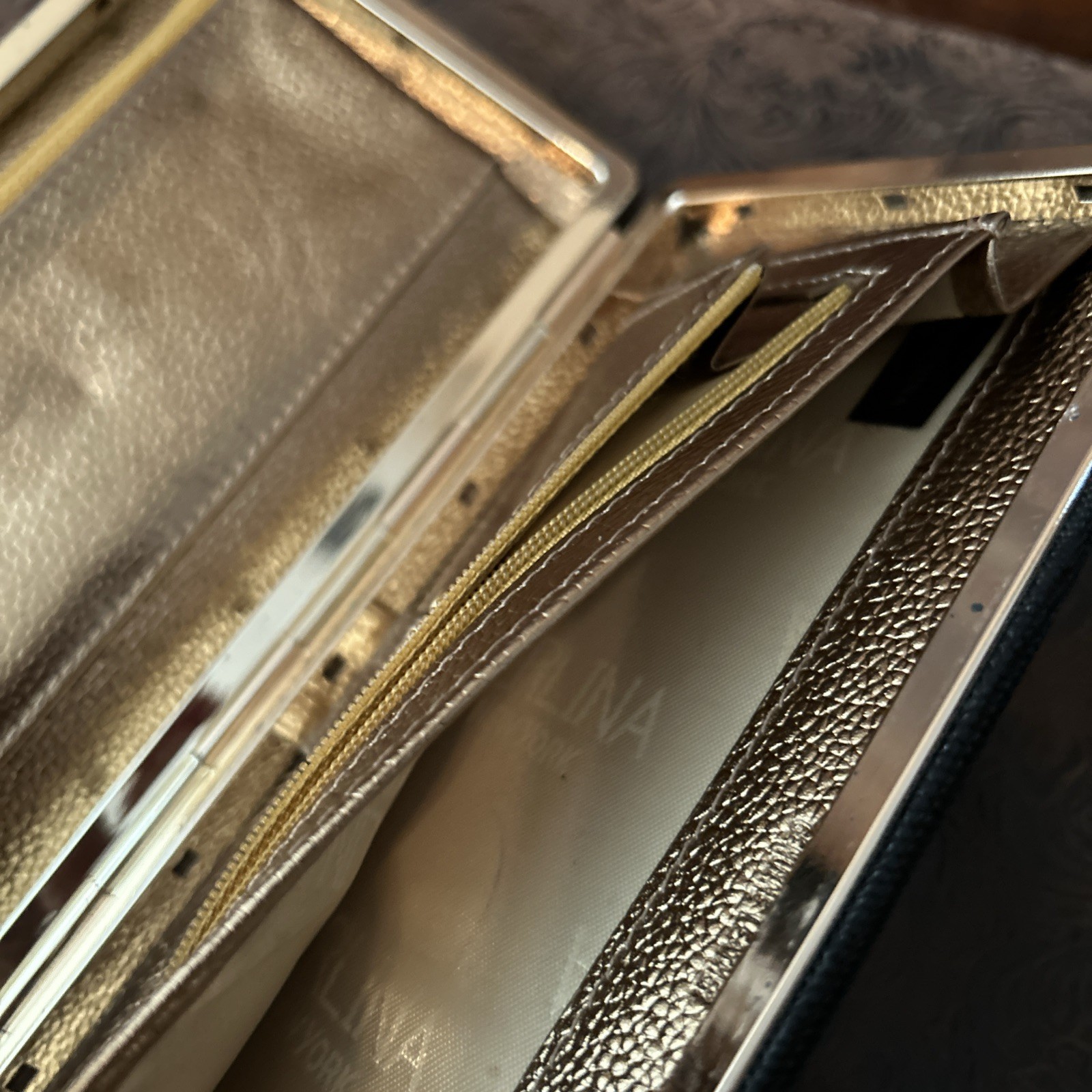 Perlina Clutch Wallet Black Leather Framed Push Look Gold Leather Interior