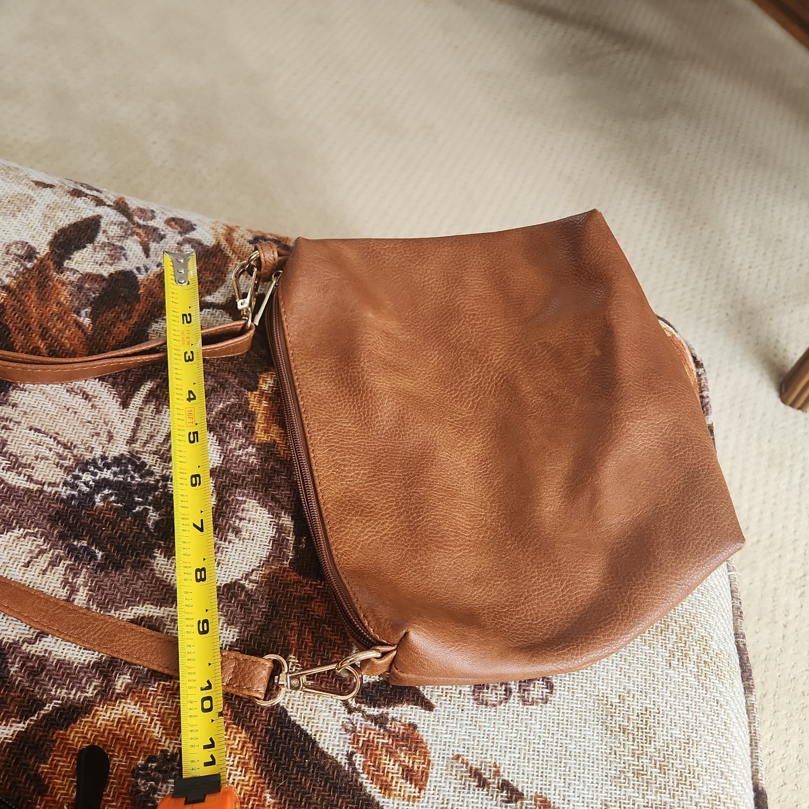 carmel nylon and faux leather crossbody bag./p
