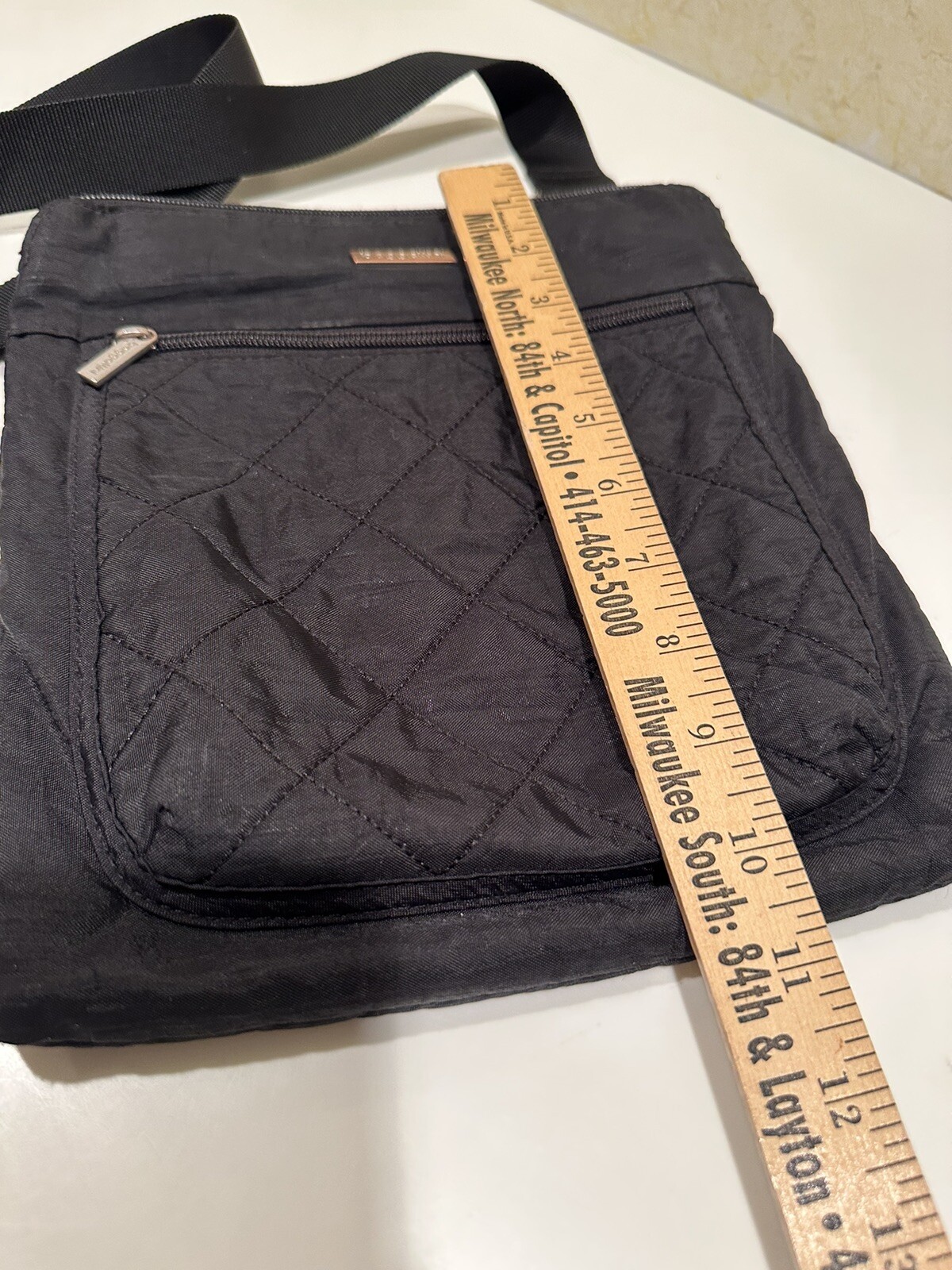Baggallini black crossbody Purse Quilted Pocket On Front Pocket On Back
