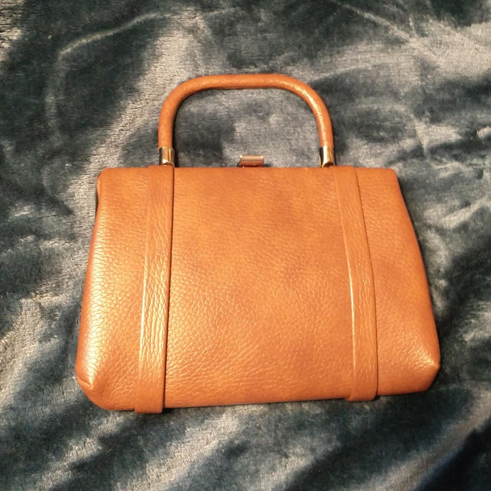 Vintage Mini Leather Handbag/Purse. Lined with patterned fabric as shown.