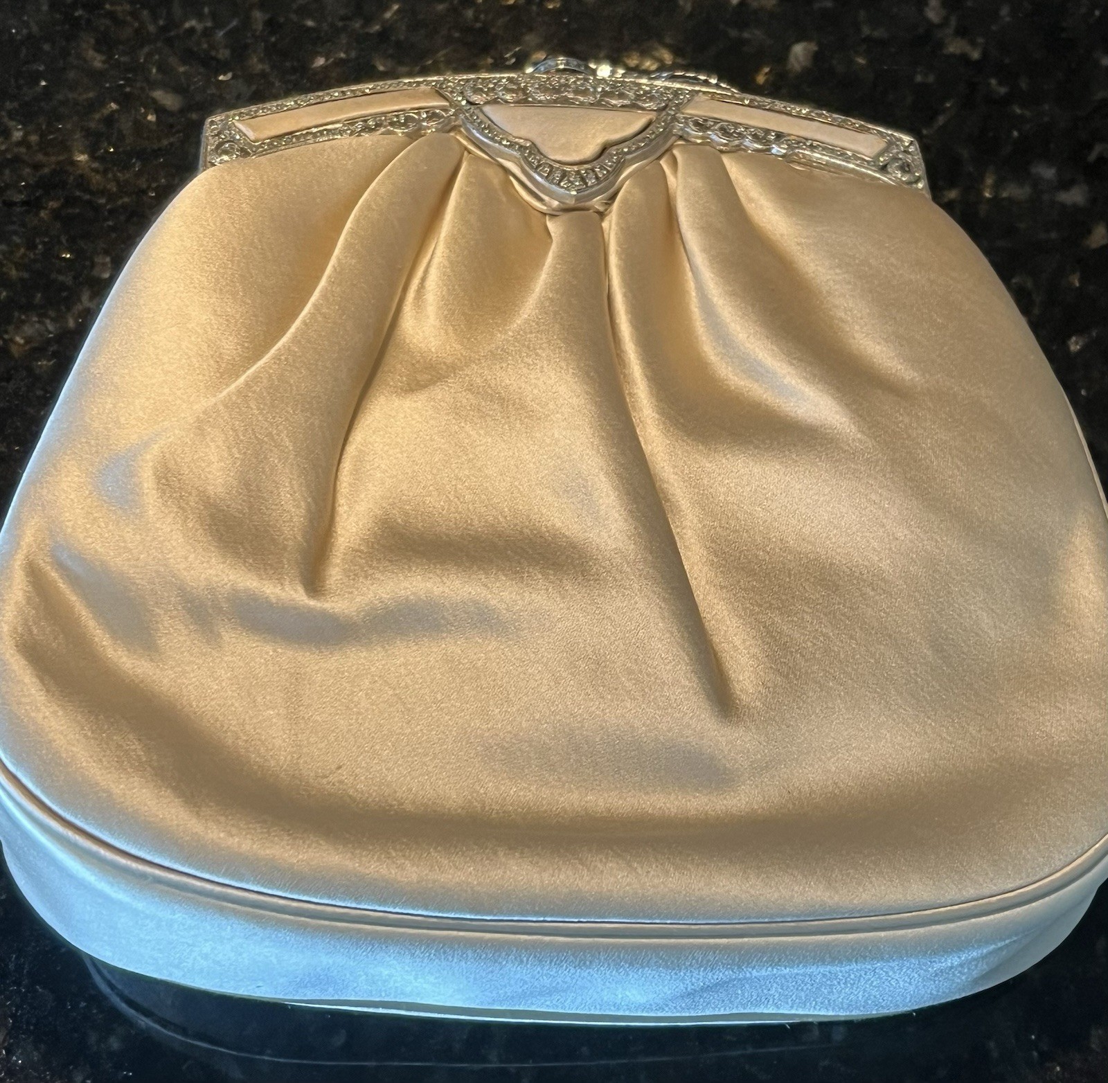 Vintage Judith Leiber satin evening clutch with Sparkling embellishments.
