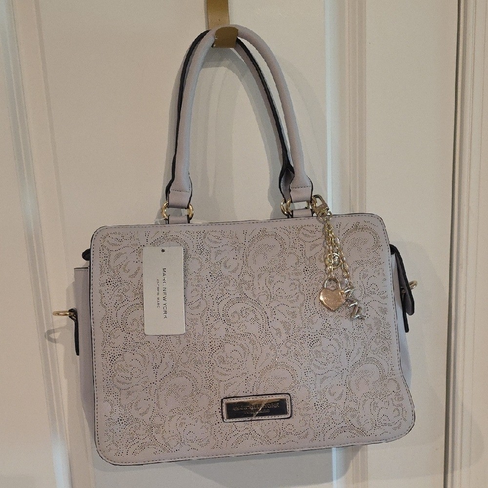 Elegant Cream Handbag with Gold Accents