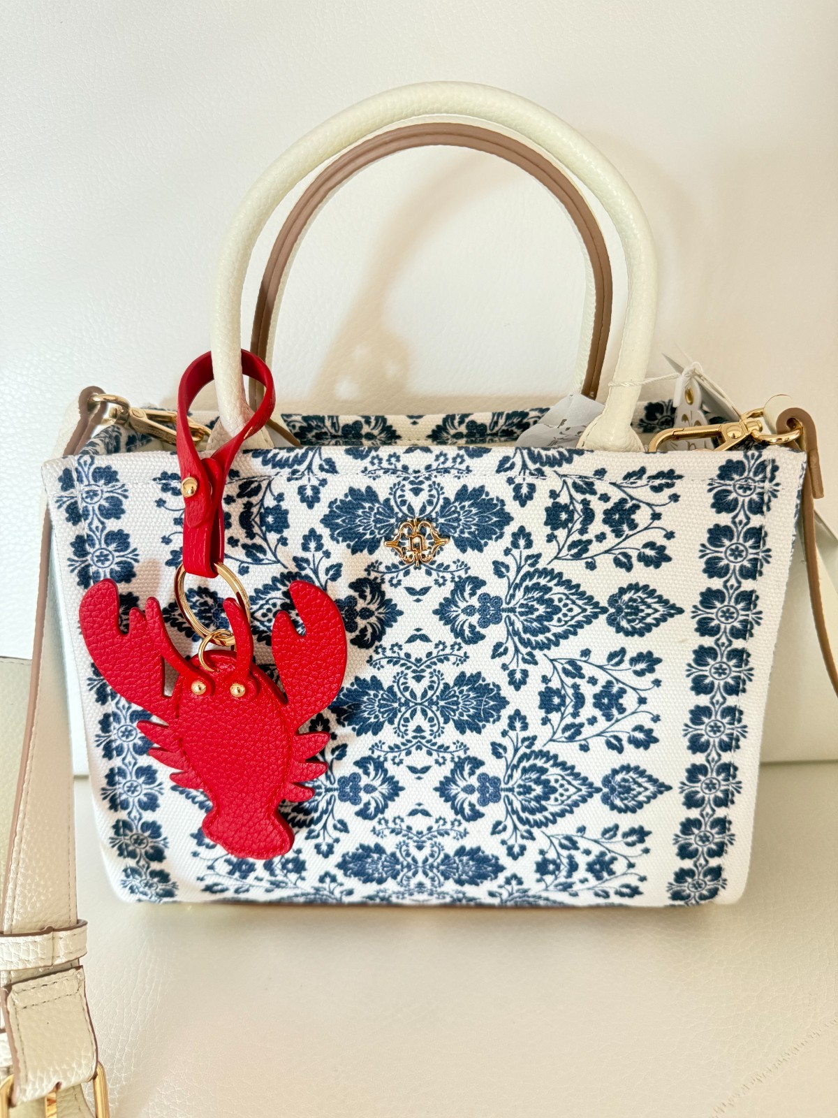 NWT NANETTE LEPORE CHERIE SATCHEL CROSSBODY BAG FLORAL TILE W AIR TAG CHARM