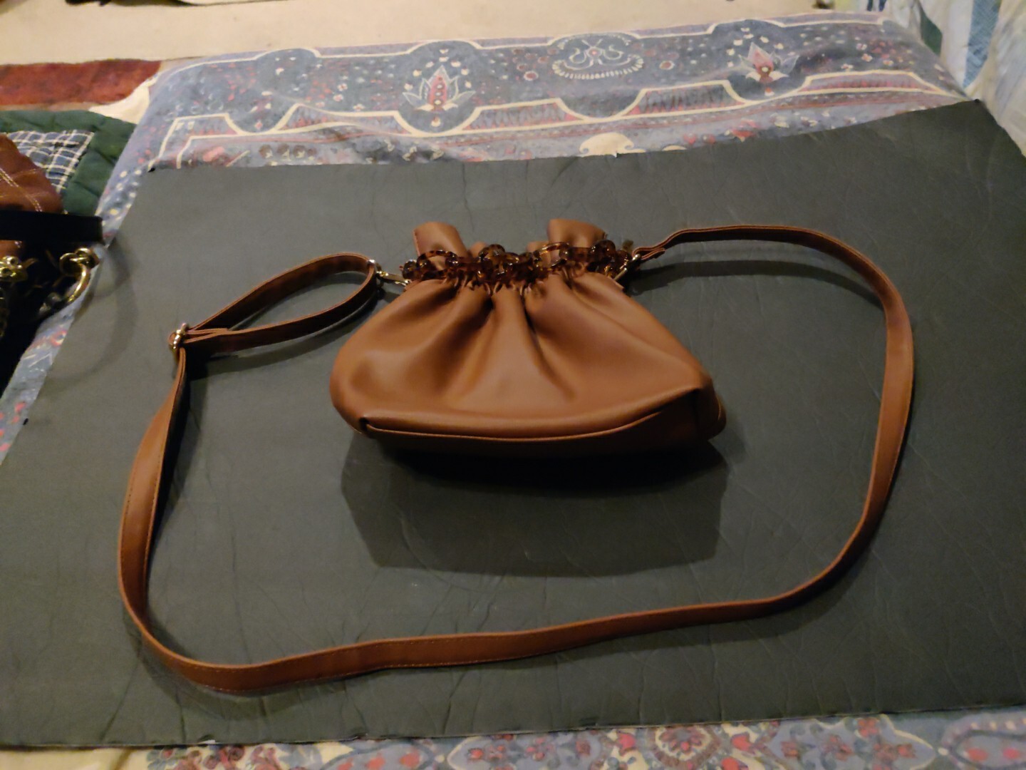 No Boundaries Women’s Drawstring Crossbody Handbag Brown Tortoise Chain