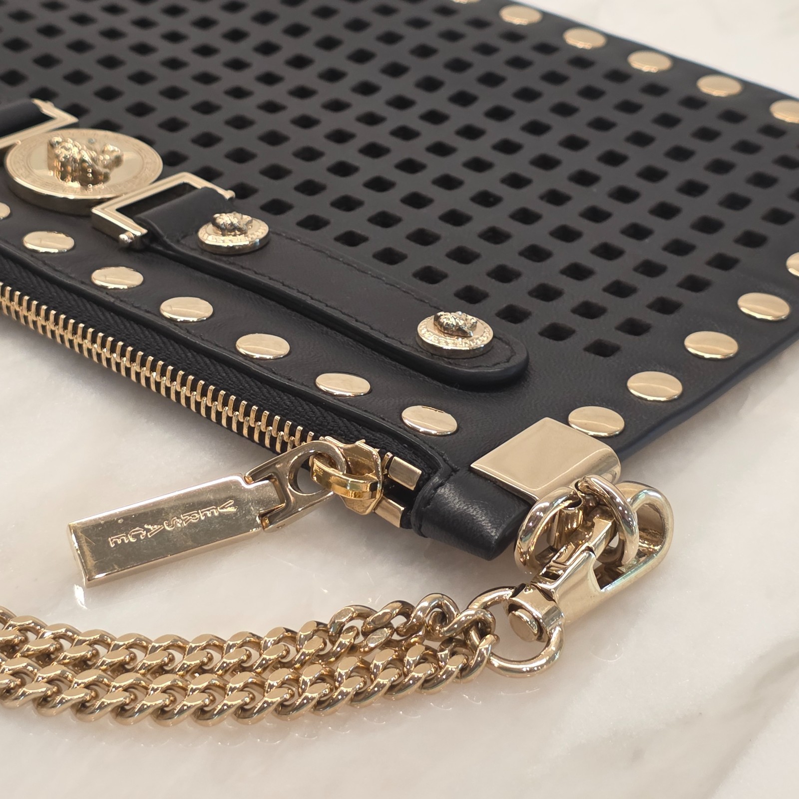 Versace Perforated Studded Black Calfskin Leather Wristlet Clutch – Gorgeous