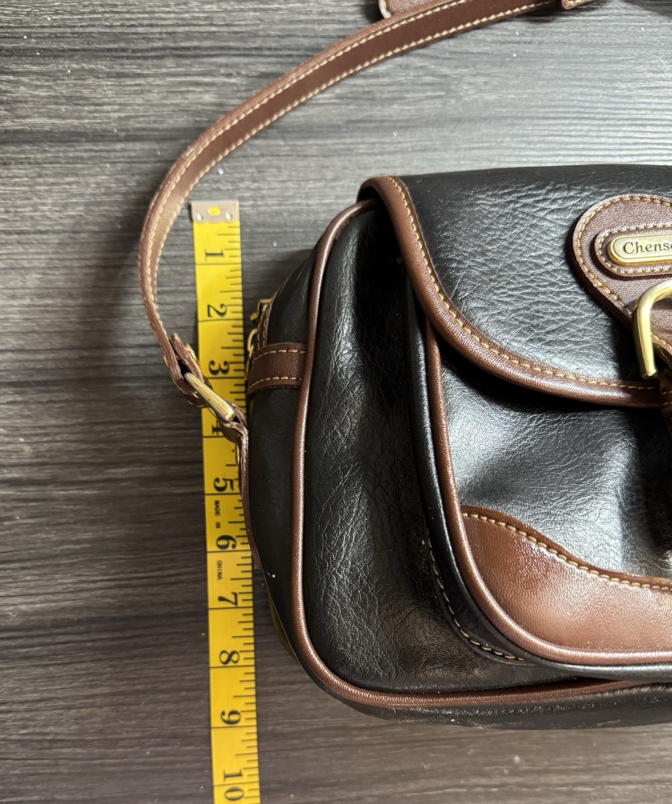 Leather Crossbody Bag Chenson Dark Black with Brown Trim .