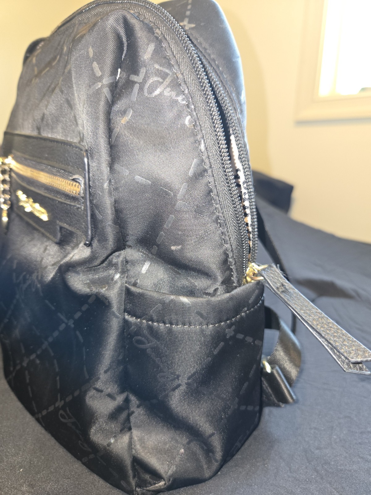 Juicy Couture Black Logo Backpack Gold Hardware Front Zip Charm Lined Pockets