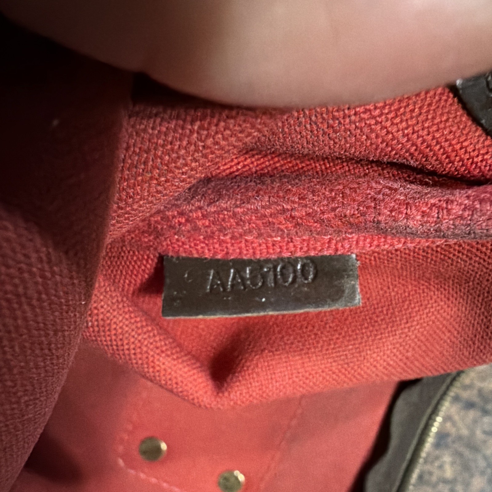 Louis Vuitton Damier Ebene Brown Small Crossbody needs repairs.