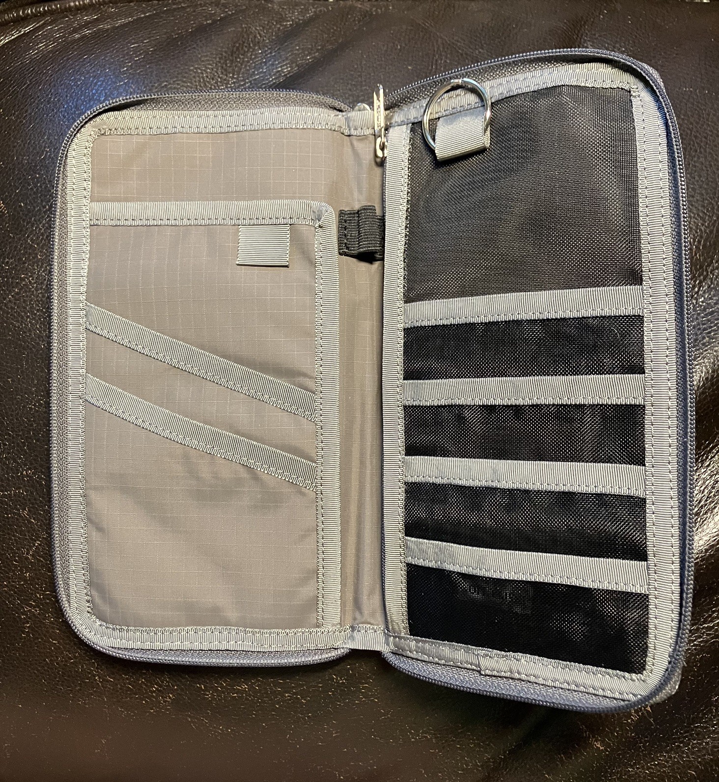 LeSportsac Grey Snake Pattern Hand Held Clutch Wallet 9.25 long X 5.25 in tall.