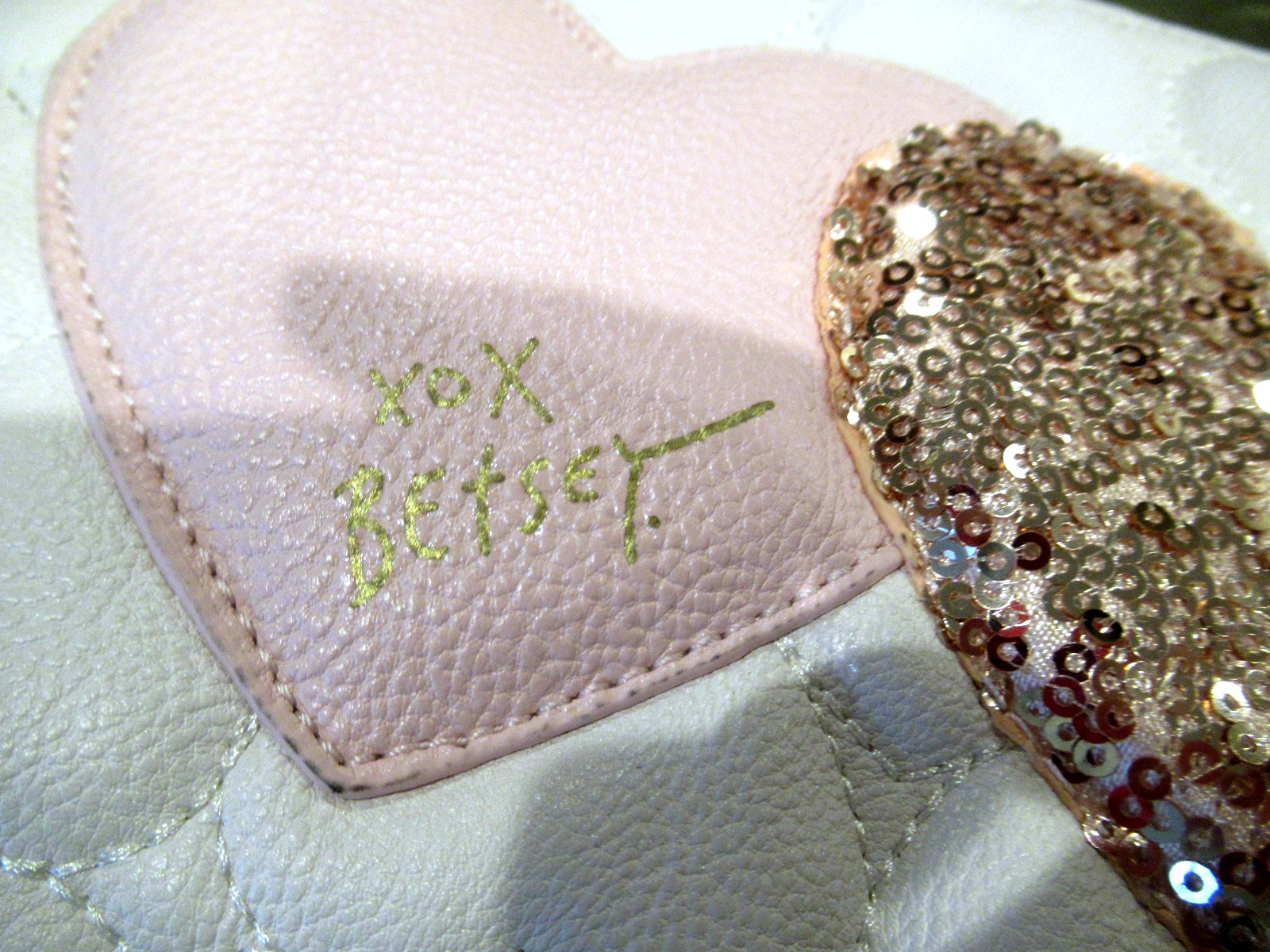 Betsey Johnson white quilted wristlet with pink hearts, 8.75 inches wide