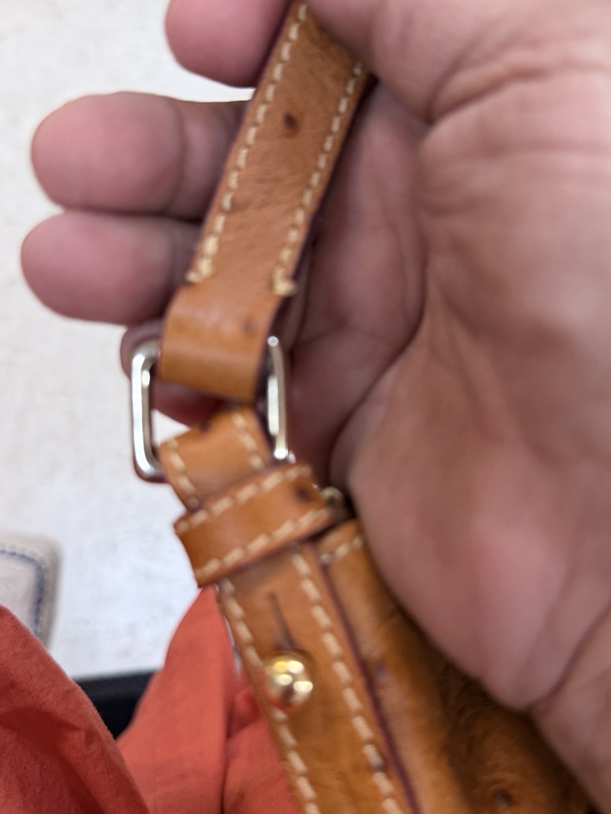 Dooney & Bourke Ostrich Embossed Leather Handbag With Shoulder Strap And Bag