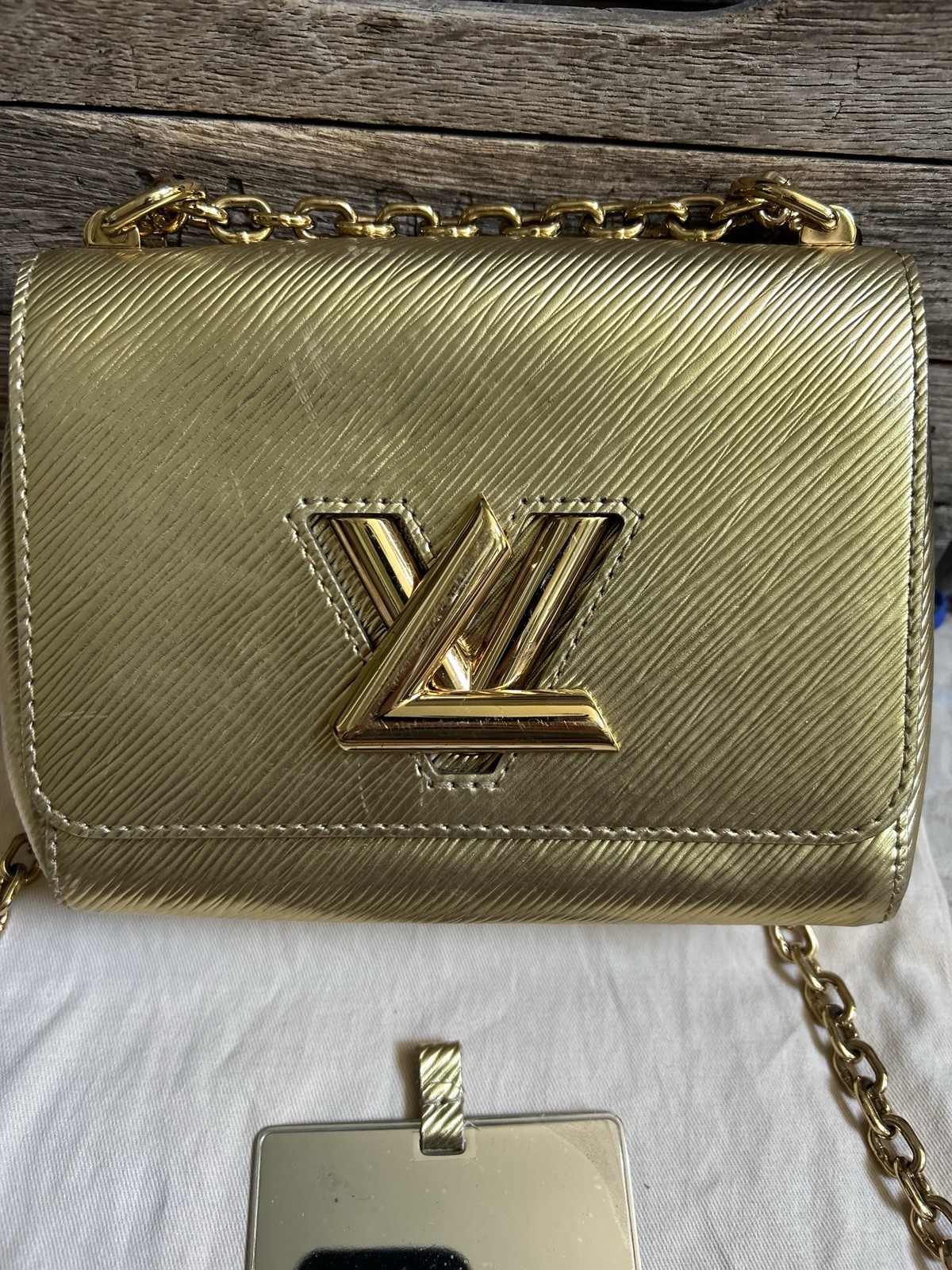 LOUIS VUITTON “Twist” gold epi leather handbag crossbody shoulder bag
