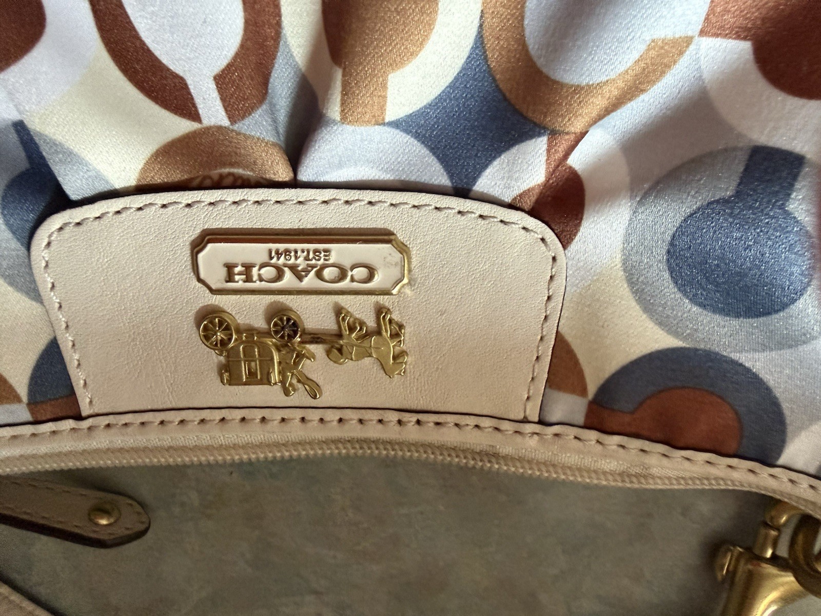 Coach Madison Graphic Op Art Shoulder Bag- Gold tone horse and carriage logo