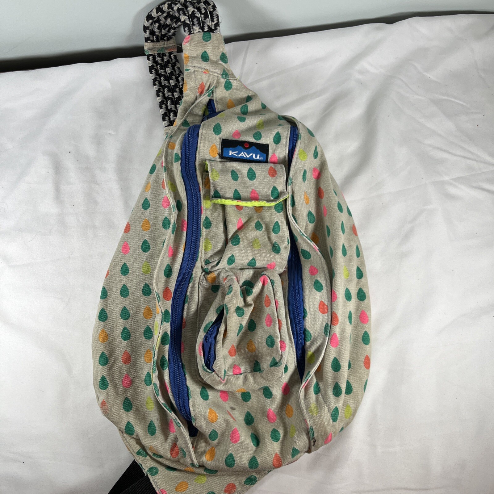 KAVU Rope Sling Backpack Crossbody Canvas Bag Beige Retro Rainbow Raindrops