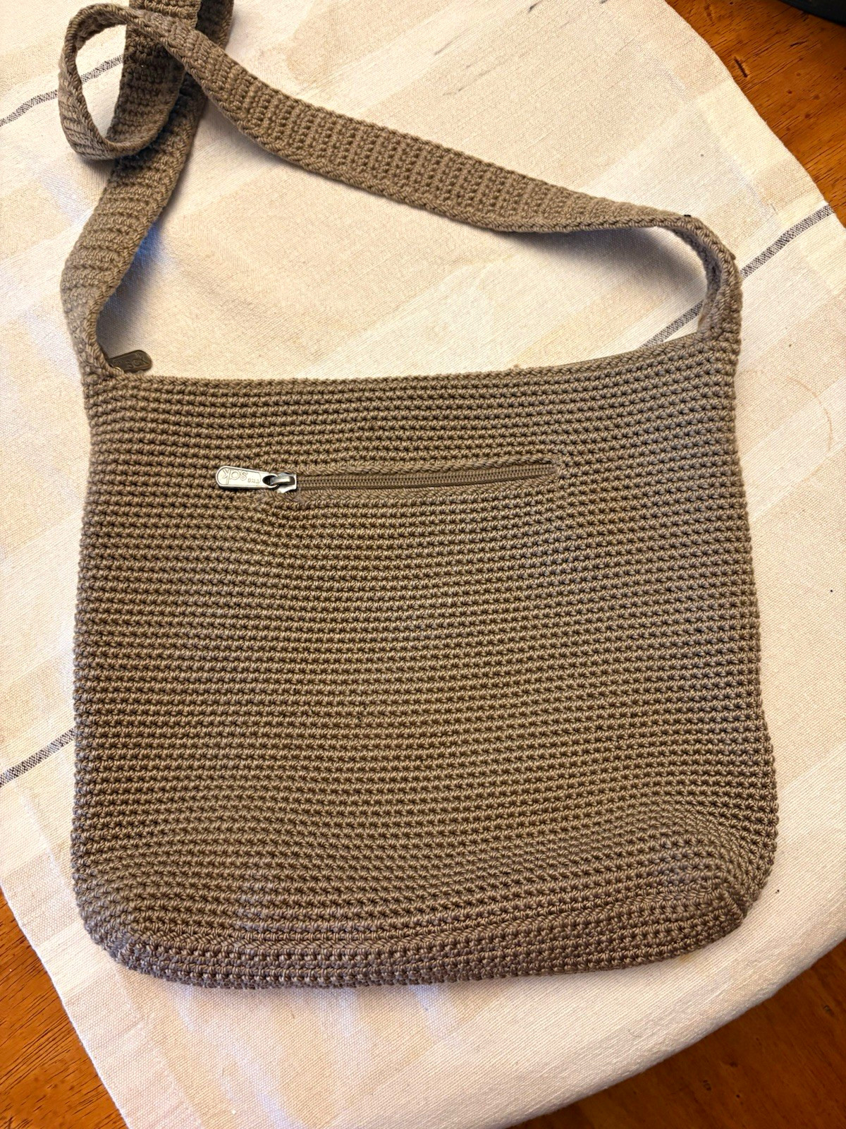 The Sak Brown Crochet Shoulder Bag Zip Closure Lined Inner Zip Pocket Silver