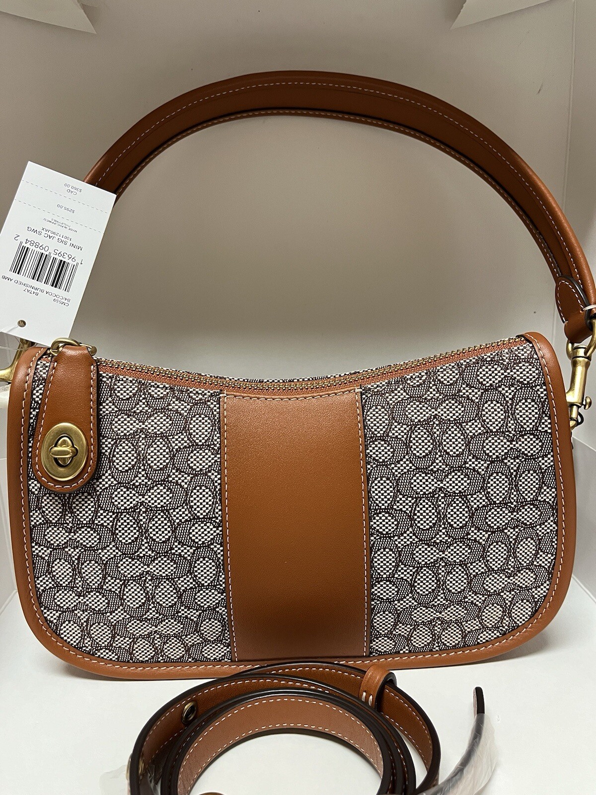 Coach Swinger leather Bag In Micro Signature Jacquard CM559